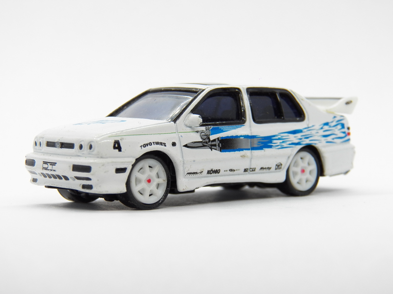 Illustration for article titled What's in the box? Car #13 Racing Champions Volkswagon Jetta - Jesse's ride.